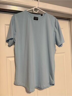 CUTS Clothing | Light Blue Curve-Hem T-Shirt PYCA Pro XL